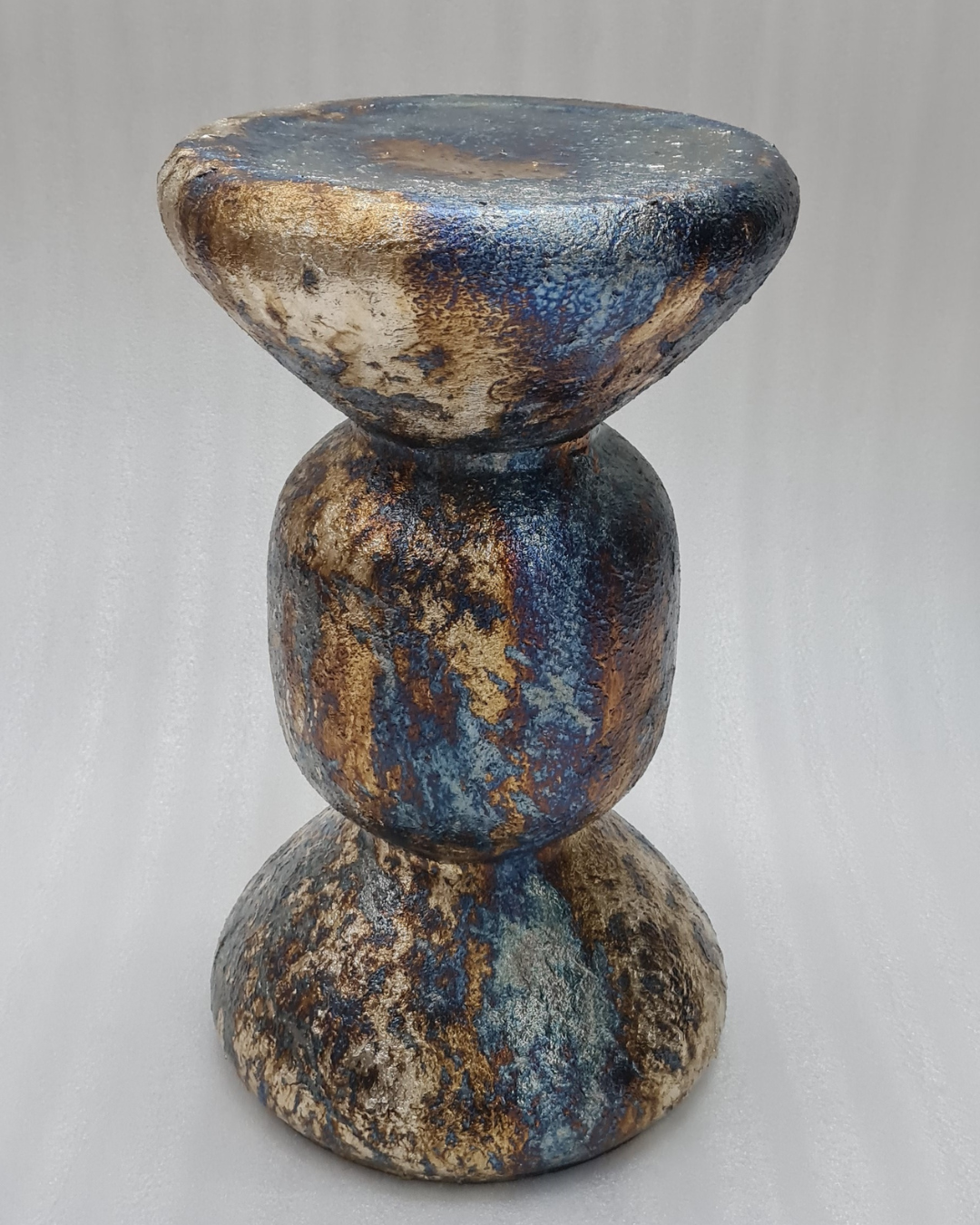 Carved wooden stool — original product on white